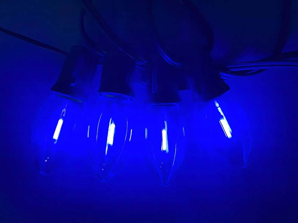 C9 blue bulb lit in a real test setup